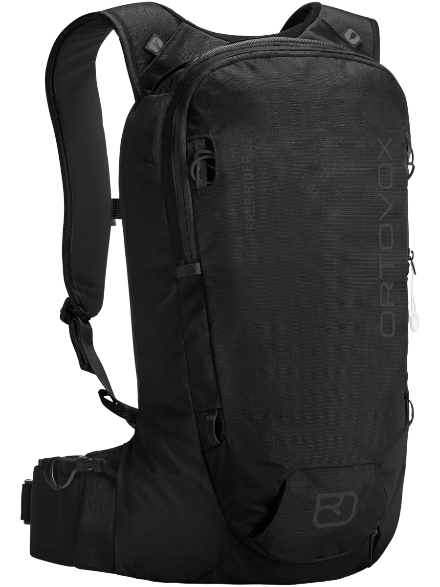 Ortovox Free Rider 22 in Black Raven, front three-quarter view showing the all-black fabric, side compression strap and hip belt