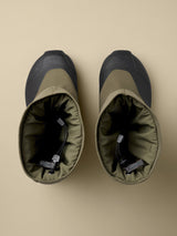 Arcteryx PostTour in Tatsu/Black, top-down view of the pair with the insulated olive collars and drawcord toggles visible