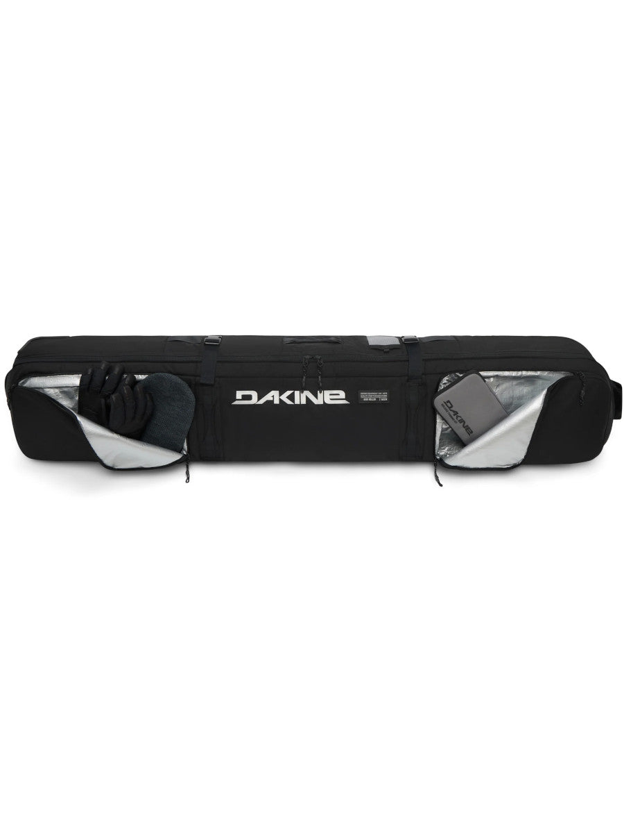 Dakine Fall Line Ski Roller Bag 190cm in Black Coated, side view with the end pockets unzipped to show gloves and accessories inside