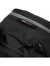 Close-up of the Dakine Heli 2.0 Pro Pack 26L in Black showing the RECCO label, grey zip trim and side compression buckle
