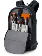 Dakine Heli 2.0 Pro Pack 26L in Black, back panel opened to show the avalanche tool pocket holding a shovel, probe and saw