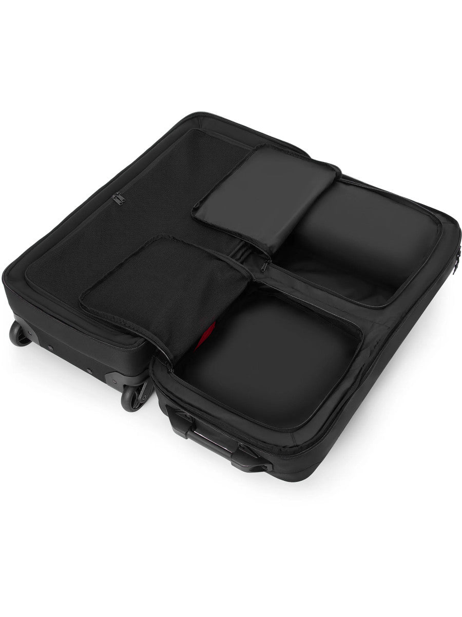 Dakine Split Roller Bag 2.0 85L in Black, opened flat to show the lower compartment holding packing cubes and an internal divider