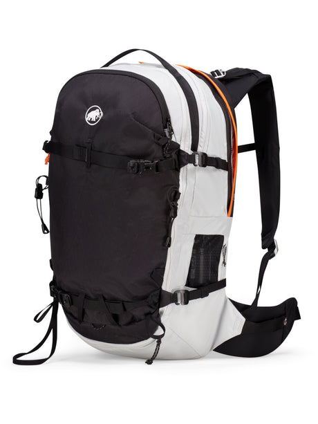Mammut Haldigrat 30 E2 Airbag M/L in Platinum, three-quarter front view showing the white body, black front panel, mesh pocket and ski straps